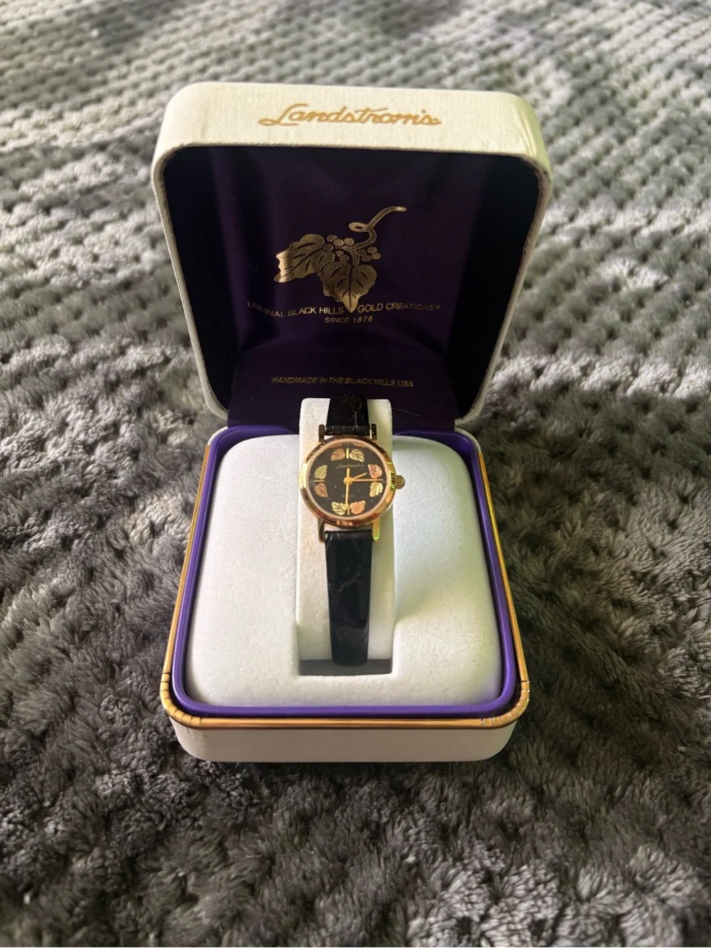 Women's Black and Gold Leaf Dial Quartz Watch